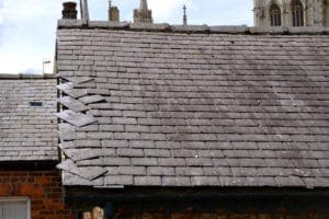 Loose slates on a house roof